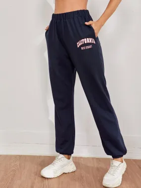 Sporty High Elastic Waist Letter Graphic Slant Pocket Joggers Sweatpants