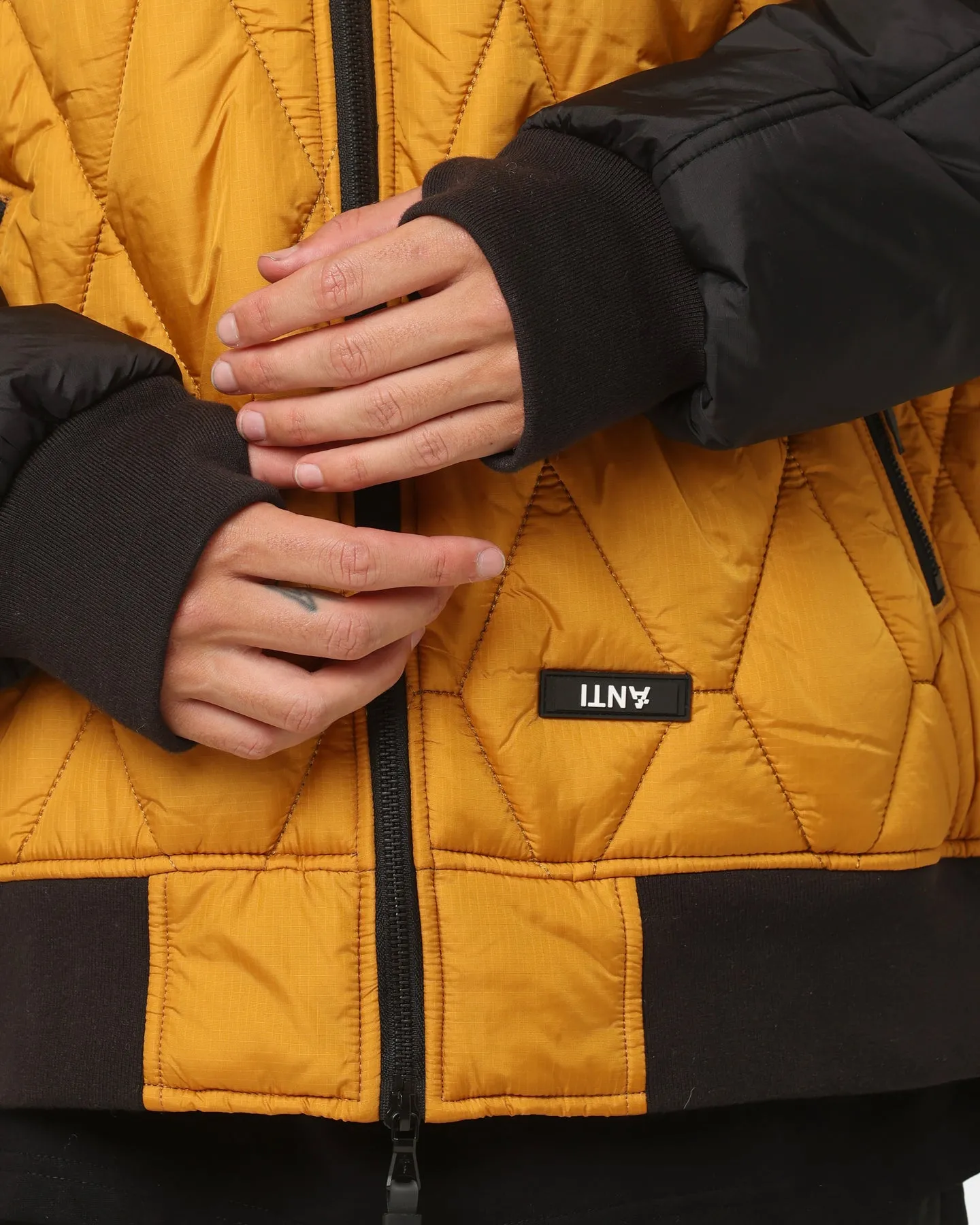 The Anti Order Corvus Quilted Bomber Jacket Mustard/Black/White